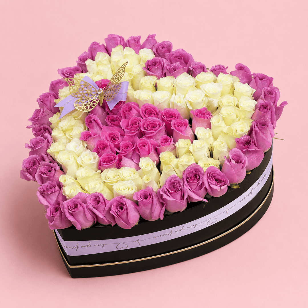Blooms & Gifts Midnight Bloom Black Heart Box with Purple, White & Baby Pink Roses