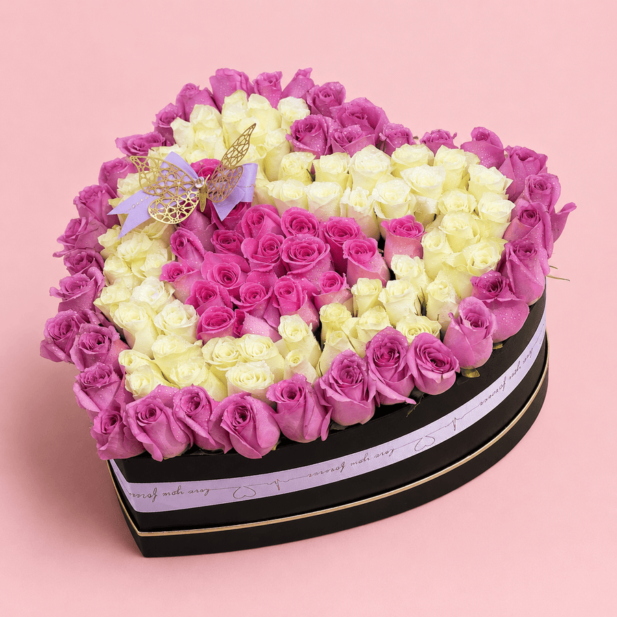 Blooms & Gifts Midnight Bloom Black Heart Box with Purple, White & Baby Pink Roses
